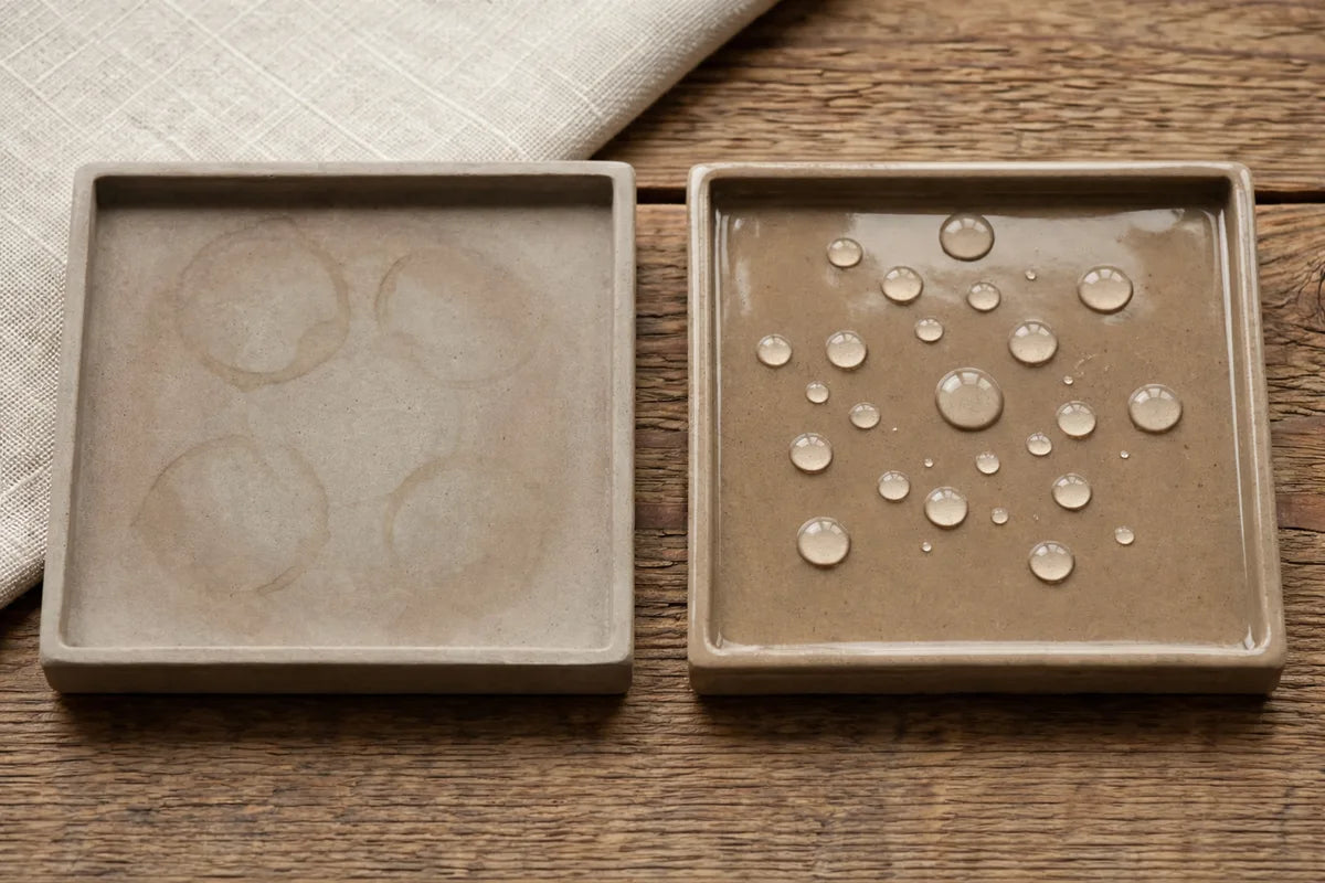 Sealed eco resin coaster on a studio bench beside a GlazeSeal bottle