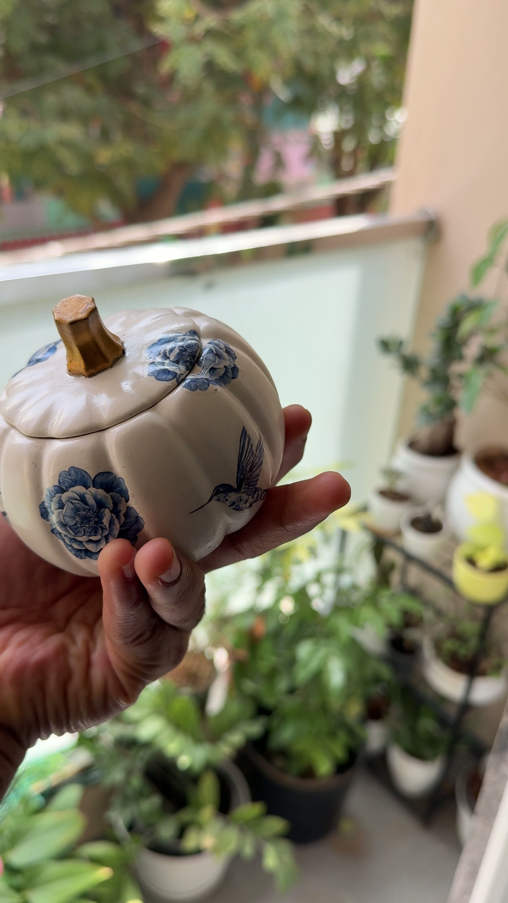 Finished vintage floral pumpkin jar with blue floral decal design